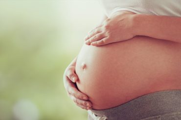 Capa do curso 'Vou Engravidar' com ícones de família e fertilidade.