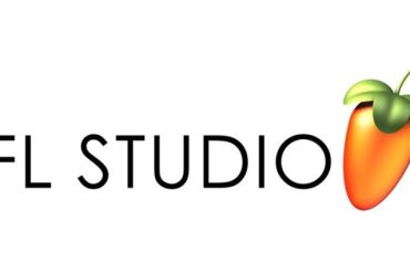 Estúdio de produção de música eletrônica com equipamentos modernos e produtor focado.